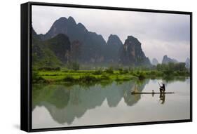 Fisherman on bamboo raft on Mingshi River at sunset, Mingshi, Guangxi Province, China-Keren Su-Framed Stretched Canvas