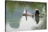 Fisherman on bamboo raft on Mingshi River with karst hills, Mingshi, Guangxi Province, China-Keren Su-Stretched Canvas