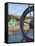 Fisherman's Point, Boat Wheel in Front of Harbor, Twillingate, Newfoundland and Labrador, Canada-Cindy Miller Hopkins-Framed Stretched Canvas