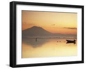 Fisherman Standing in Sea with Mount Agung in the Background, Sanur, Bali, Indonesia-Ian Trower-Framed Photographic Print