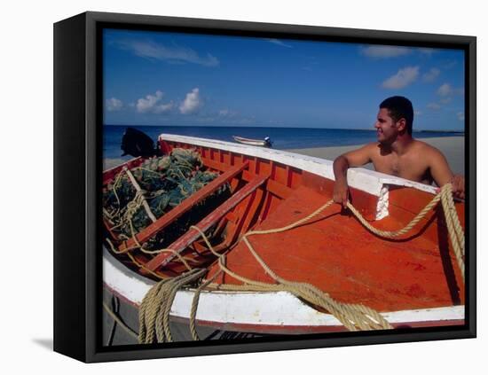 Fisherman Tends His Boat on the Beach, Isla Margarita, Venezuela-Greg Johnston-Framed Stretched Canvas