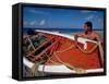 Fisherman Tends His Boat on the Beach, Isla Margarita, Venezuela-Greg Johnston-Framed Stretched Canvas