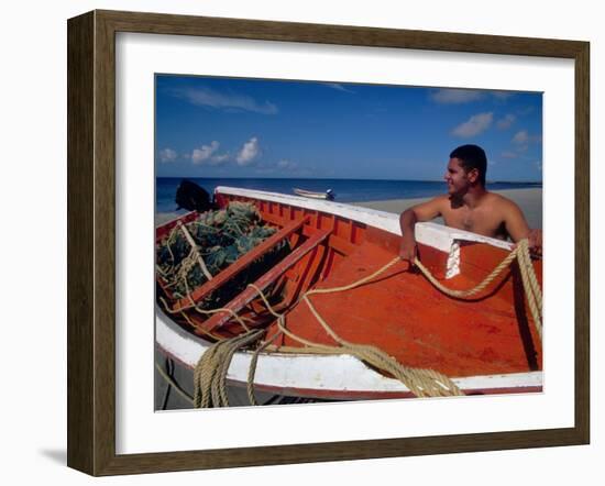 Fisherman Tends His Boat on the Beach, Isla Margarita, Venezuela-Greg Johnston-Framed Premium Photographic Print