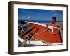 Fisherman Tends His Boat on the Beach, Isla Margarita, Venezuela-Greg Johnston-Framed Premium Photographic Print