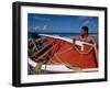 Fisherman Tends His Boat on the Beach, Isla Margarita, Venezuela-Greg Johnston-Framed Premium Photographic Print