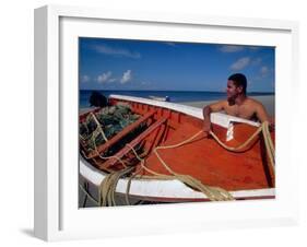 Fisherman Tends His Boat on the Beach, Isla Margarita, Venezuela-Greg Johnston-Framed Premium Photographic Print