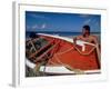 Fisherman Tends His Boat on the Beach, Isla Margarita, Venezuela-Greg Johnston-Framed Photographic Print