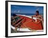 Fisherman Tends His Boat on the Beach, Isla Margarita, Venezuela-Greg Johnston-Framed Photographic Print