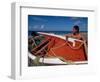 Fisherman Tends His Boat on the Beach, Isla Margarita, Venezuela-Greg Johnston-Framed Photographic Print