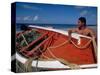 Fisherman Tends His Boat on the Beach, Isla Margarita, Venezuela-Greg Johnston-Stretched Canvas