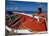 Fisherman Tends His Boat on the Beach, Isla Margarita, Venezuela-Greg Johnston-Stretched Canvas