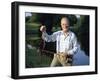 Fisherman with Bass-null-Framed Premium Photographic Print