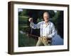 Fisherman with Bass-null-Framed Photographic Print