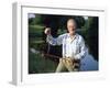 Fisherman with Bass-null-Framed Photographic Print