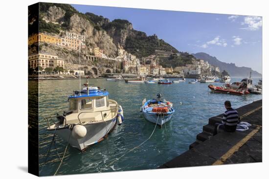 Fisherman Working on Harbour Quayside with View Towards Amalfi Town and Fishing Boats-Eleanor Scriven-Stretched Canvas