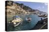 Fisherman Working on Harbour Quayside with View Towards Amalfi Town and Fishing Boats-Eleanor Scriven-Stretched Canvas