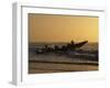 Fishermen Launch their Boat into the Atlantic Ocean at Sunset-Amar Grover-Framed Photographic Print