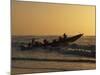 Fishermen Launch their Boat into the Atlantic Ocean at Sunset-Amar Grover-Mounted Photographic Print