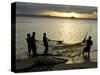 Fishermen Pulling in the Nets at Dawn, Ramena Beach, Diego Suarez, North Madagascar-Inaki Relanzon-Stretched Canvas