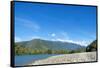 Fishermen walking along a shingle beach next to the trout-filled Puelo River in Northern Patagonia,-Alex Robinson-Framed Stretched Canvas