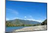 Fishermen walking along a shingle beach next to the trout-filled Puelo River in Northern Patagonia,-Alex Robinson-Mounted Photographic Print