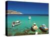 Fishiing Boats and Man Snorkelling at Anopi Beach, Karpathos, Dodecanese, Greek Islands, Greece-Sakis Papadopoulos-Stretched Canvas