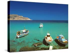 Fishiing Boats and Man Snorkelling at Anopi Beach, Karpathos, Dodecanese, Greek Islands, Greece-Sakis Papadopoulos-Stretched Canvas