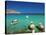 Fishiing Boats and Man Snorkelling at Anopi Beach, Karpathos, Dodecanese, Greek Islands, Greece-Sakis Papadopoulos-Stretched Canvas