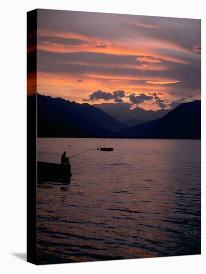 Fishing at Sunset, Lake Maggiore, Italy-Peter Thompson-Stretched Canvas