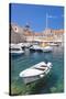 Fishing boat and clear water in the Old Port, Dubrovnik Old Town, Dubrovnik, Dalmatian Coast, Croat-Neale Clark-Stretched Canvas