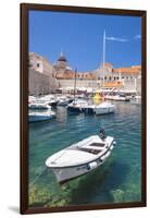 Fishing boat and clear water in the Old Port, Dubrovnik Old Town, Dubrovnik, Dalmatian Coast, Croat-Neale Clark-Framed Photographic Print