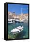 Fishing boat and clear water in the Old Port, Dubrovnik Old Town, Dubrovnik, Dalmatian Coast, Croat-Neale Clark-Framed Stretched Canvas