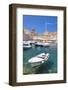 Fishing boat and clear water in the Old Port, Dubrovnik Old Town, Dubrovnik, Dalmatian Coast, Croat-Neale Clark-Framed Photographic Print