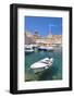 Fishing boat and clear water in the Old Port, Dubrovnik Old Town, Dubrovnik, Dalmatian Coast, Croat-Neale Clark-Framed Photographic Print