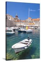 Fishing boat and clear water in the Old Port, Dubrovnik Old Town, Dubrovnik, Dalmatian Coast, Croat-Neale Clark-Stretched Canvas
