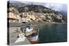 Fishing Boat at Quayside and Positano Town, Costiera Amalfitana (Amalfi Coast), Campania, Italy-Eleanor Scriven-Stretched Canvas