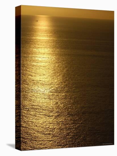 Fishing Boat in Distance on Sea at Sunset, Manabi Province, Ecuador-Pete Oxford-Stretched Canvas