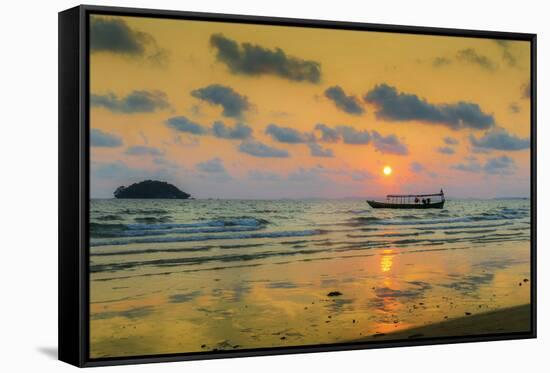 Fishing boat moored off beach south of the city at sunset, Otres Beach, Sihanoukville, Cambodia-Robert Francis-Framed Stretched Canvas