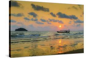 Fishing boat moored off beach south of the city at sunset, Otres Beach, Sihanoukville, Cambodia-Robert Francis-Stretched Canvas