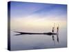 Fishing Boat Reflected on Inle Lake, Burma-Brian McGilloway-Stretched Canvas