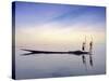 Fishing Boat Reflected on Inle Lake, Burma-Brian McGilloway-Stretched Canvas