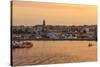 Fishing boats and town at sunrise, Palamos, Costa Brava, Girona, Catalonia, Spain, Europe-Eleanor Scriven-Stretched Canvas
