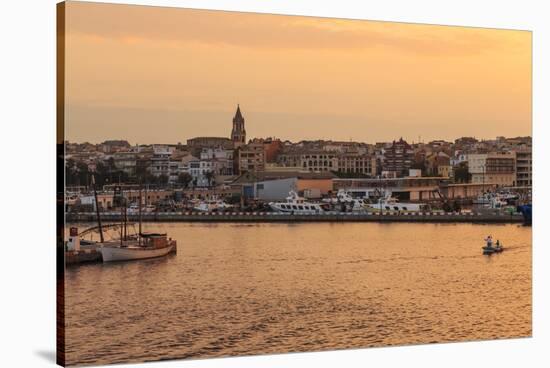 Fishing boats and town at sunrise, Palamos, Costa Brava, Girona, Catalonia, Spain, Europe-Eleanor Scriven-Stretched Canvas