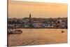 Fishing boats and town at sunrise, Palamos, Costa Brava, Girona, Catalonia, Spain, Europe-Eleanor Scriven-Stretched Canvas