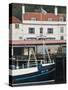 Fishing Boats in Whitby Harbour with Famous Magpie Cafe in Background, Yorkshire, England-John Woodworth-Stretched Canvas