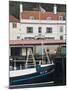 Fishing Boats in Whitby Harbour with Famous Magpie Cafe in Background, Yorkshire, England-John Woodworth-Mounted Photographic Print