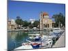 Fishing Boats Moored in Harbour and Domed Church, Aegina Town, Aegina, Saronic Islands, Greece-Lightfoot Jeremy-Mounted Photographic Print