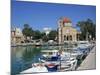 Fishing Boats Moored in Harbour and Domed Church, Aegina Town, Aegina, Saronic Islands, Greece-Lightfoot Jeremy-Mounted Photographic Print