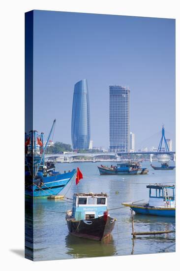 Fishing Boats on Song River and City Skyline, Da Nang, Vietnam, Indochina, Southeast Asia, Asia-Ian Trower-Stretched Canvas