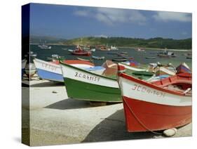 Fishing Boats on the Beach and in the Harbour of the Village of Muxia in Galicia, Spain, Europe-Michael Busselle-Stretched Canvas